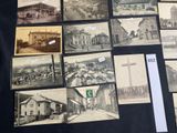 several old black and white photographs of buildings and people on a street