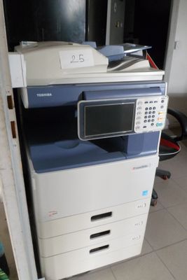 a photo of a multi - function printer in a room