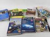 a lot of books that are sitting on a table