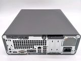 a black computer with a hard drive on top of it