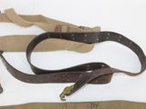 several different types of belts are laid out on a white surface