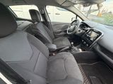 the interior of a car with the front seats folded down