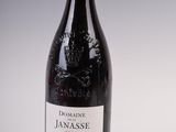 a bottle of wine that is sitting on a table