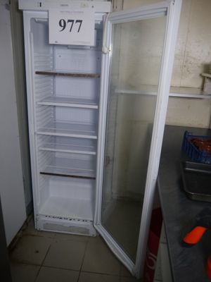 a refrigerator that has a price tag on the door