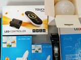 several boxes of electronic gadgets sit on a table next to each other