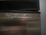 a close up of a stainless steel oven with the door open