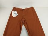 a pair of brown pants on a white surface