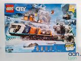 a box of lego city set with a train on the tracks