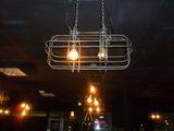 a light that is hanging from the ceiling in a restaurant
