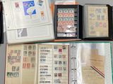 many different types of stamps in a binder