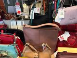 a lot of bags that are sitting on a table