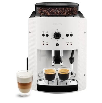 a white coffee machine with two cups of coffee next to it