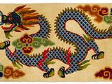 an oriental rug with a dragon design on it