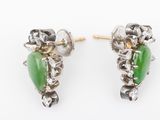 a pair of green jade and diamond earrings