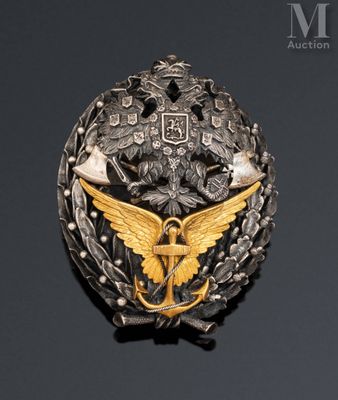 a close up of a badge on a black surface
