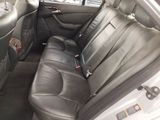 a picture of the back seat of a car that is empty