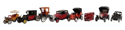 many toy cars that are lined up in a row