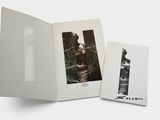an open book with a picture of a man and a woman