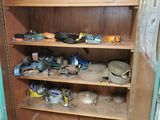 a cabinet with many tools on it in a room