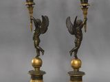 pair of antique bronze candlesticks with cherenshes and cherenshes