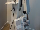 a machine that is sitting on a stand in a room