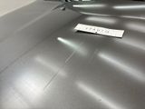 a pair of scissors sitting on top of a piece of luggage