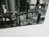 a painting on the wall of a room with a black and white picture