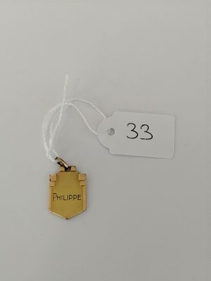 a close up of a tag with a small house on it