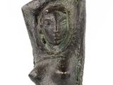 statue of a woman holding a baby in her arms