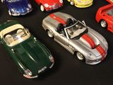 a lot of toy cars that are on a table