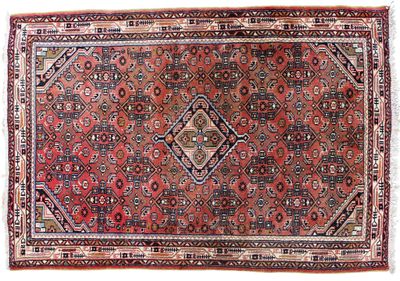 un tapis rouge à motifs de losanges sur fond blanc