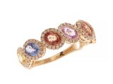 une bague en or sertie de pierres multicolores et de diamants