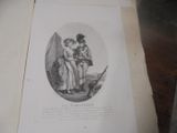 un vieux livre sur lequel figure l'image d'un homme et d'une femme