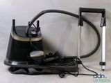 an image of a black and gold vacuum cleaner