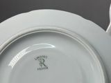 an image of a close up of a plate with a tag on it