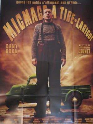 l'affiche d'un film mettant en scène un homme debout devant un camion vert