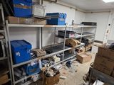 a room filled with lots of boxes and boxes on the shelves