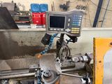a machine that is working on a machine that is in a factory