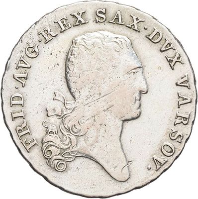 an old silver coin with a woman ' s head on it