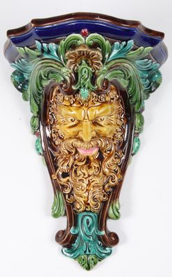 an image of a wall decoration of a man ' s face