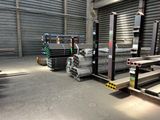 a large warehouse with a lot of metal items