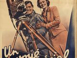 an old movie poster with a man and a woman on it