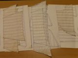 four pieces of paper with drawings of a sailboat on them