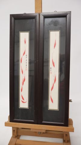Lot de deux cadres décoratifs asiatiques