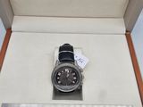 a watch that is in a box on a table