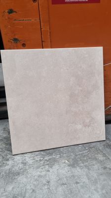 a close up of a piece of tile on the ground