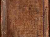 an old wooden picture frame with a picture of a cat on it