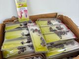 a cardboard box filled with assorted items for sale