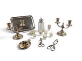 a lot of silver objects that are on the table