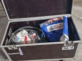 a suitcase that has a bunch of items inside of it